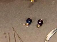 Bead dangles with attached wire